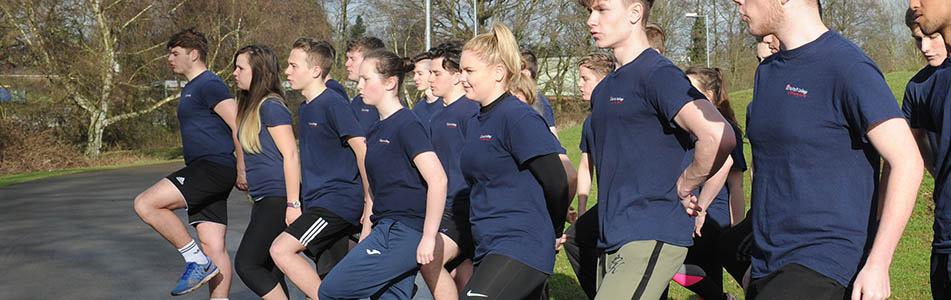 UPS students participating in physical activity (high knees)